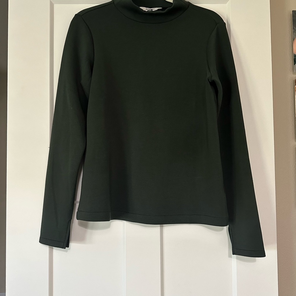 SPANX Air Essentials Mock Neck Pullover in Dark Green